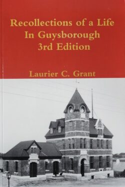 Cover photo of book titled "Recollections of a Life in Guysborough 3rd Edition" by Laurier C. Grant. Cover image includes a historic photo of the large brick Post Office building in Guysborough